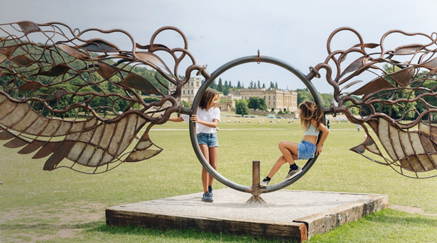 “Wings of the Wind” with Chatsworth House in the background.